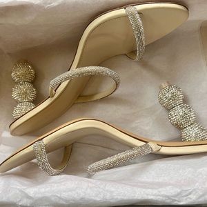 Cult Gaia Envi sandals in sand & silver.